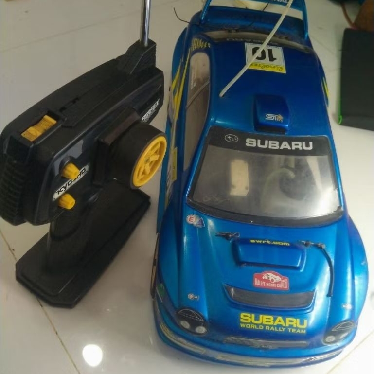 Mobil  RC 1/10 Engine KIOSO Jarang di pakai / Bekas