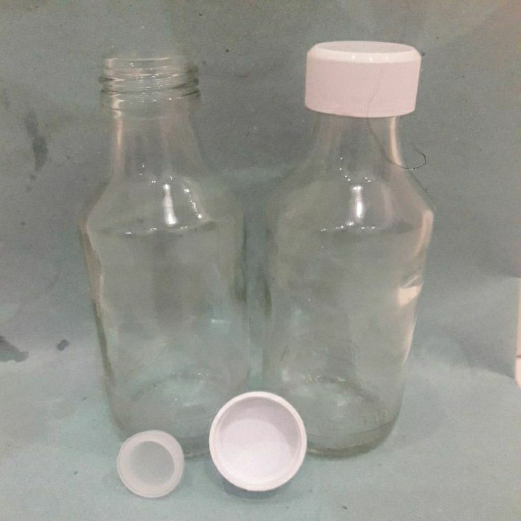 Botol kaca bekas U C 1000 (sudah bersih) + tutup plastik luar dalam