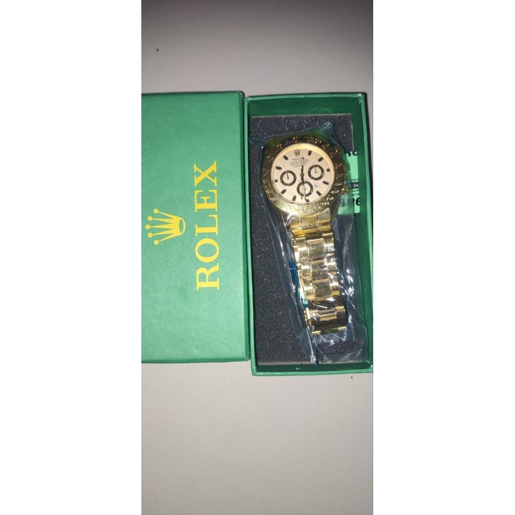 Jam Tangan Rolex Analog Pria Warna Emas dengan Tali Biru