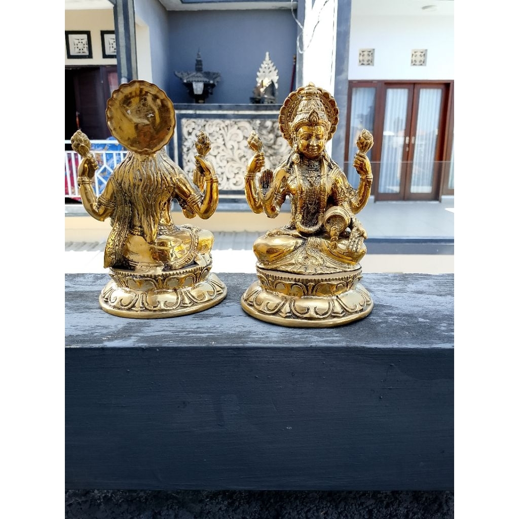 Patung Dewi Sri Laksmi bahan logam Kuningan atau patung rambut sedana