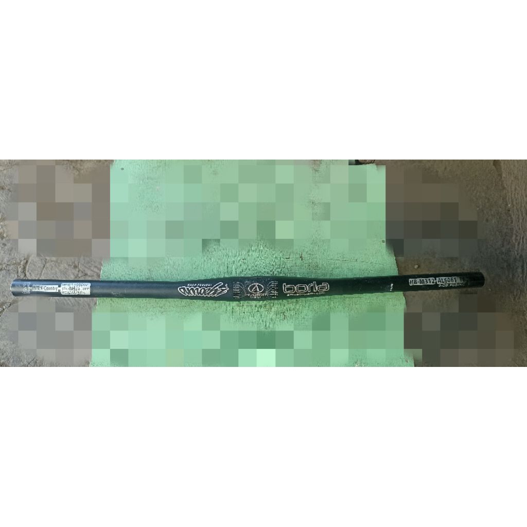 handlebar flat amoeba borla