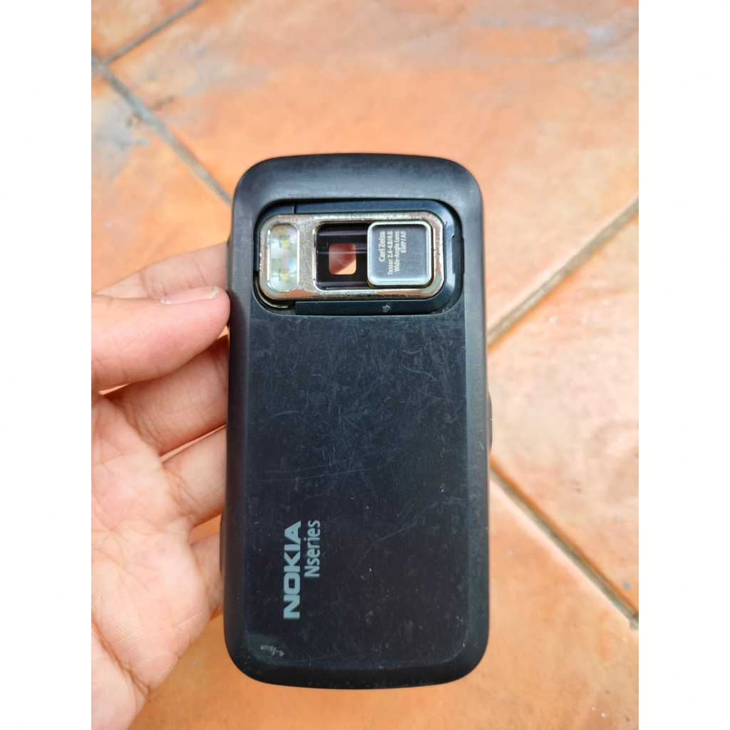 Tutup baterai atau backcover/backdoor dan Cover kamera Nokia N86 8mp Copotan