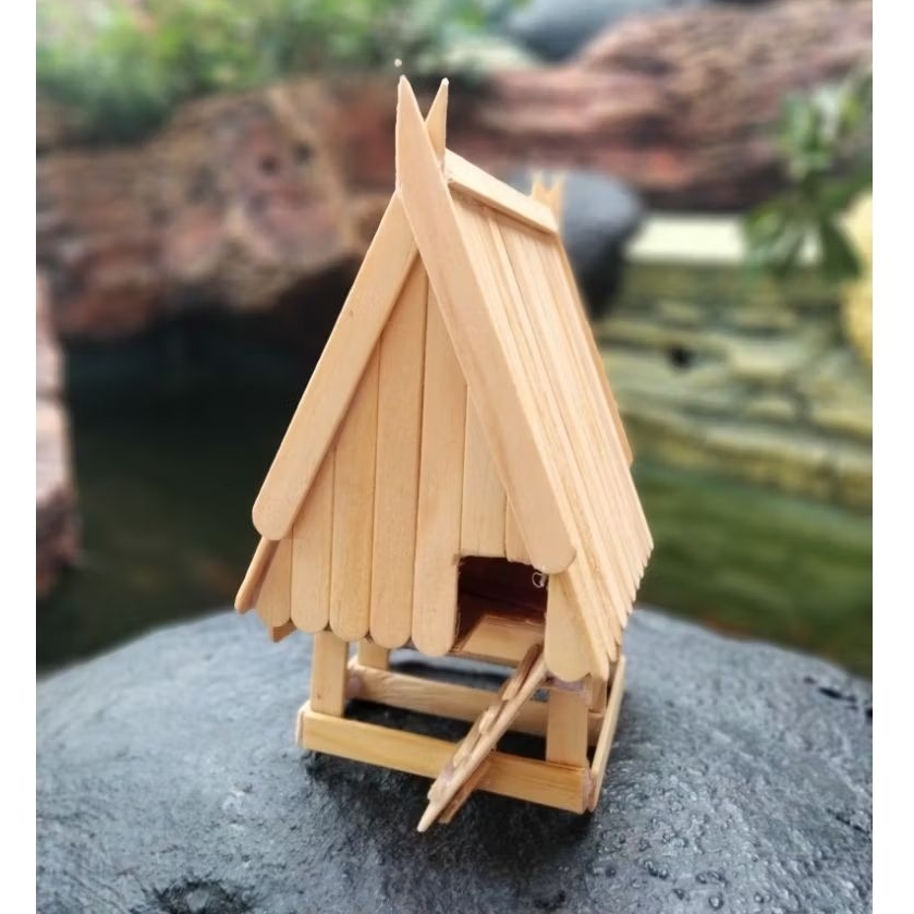 Rumah adat Sulawesi Tengah Tambi stik es cream