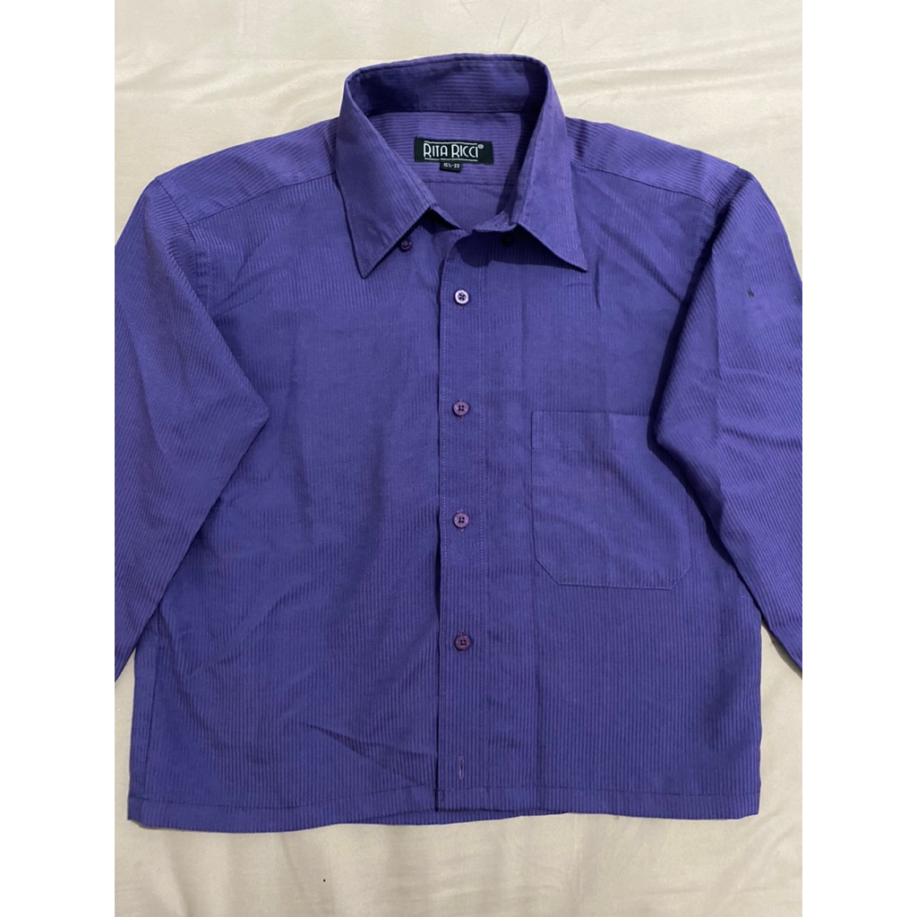 rita ricci purple shirt