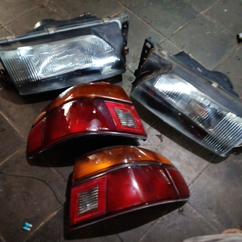 headlamp stoplamp ford laser ghia,champ