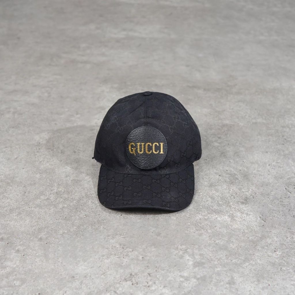 GUCCI GG SUPREME Gold Text Patch Cap in Black