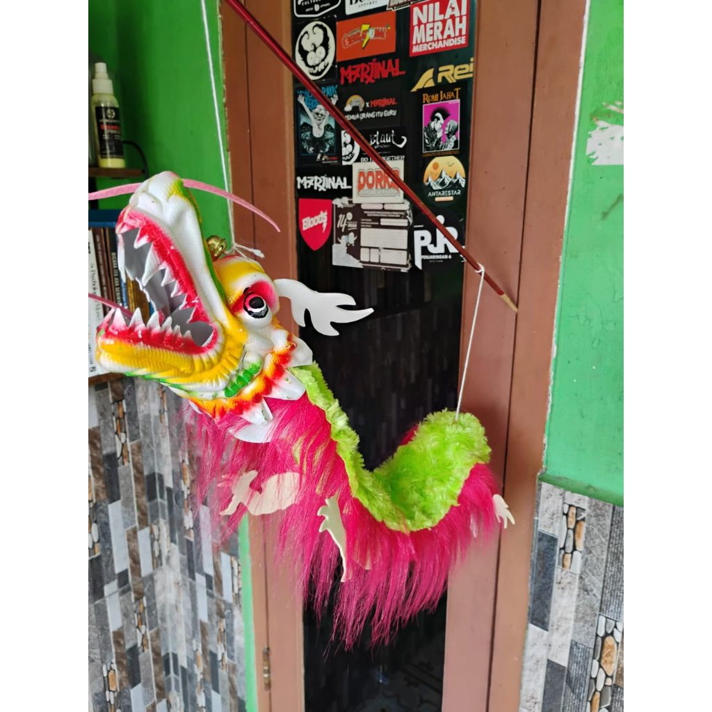 Mainan anak naga liong