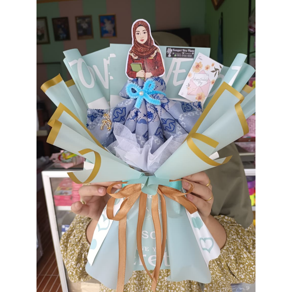 BUKET JILBAB KADO HARI GURU KADO UNIK