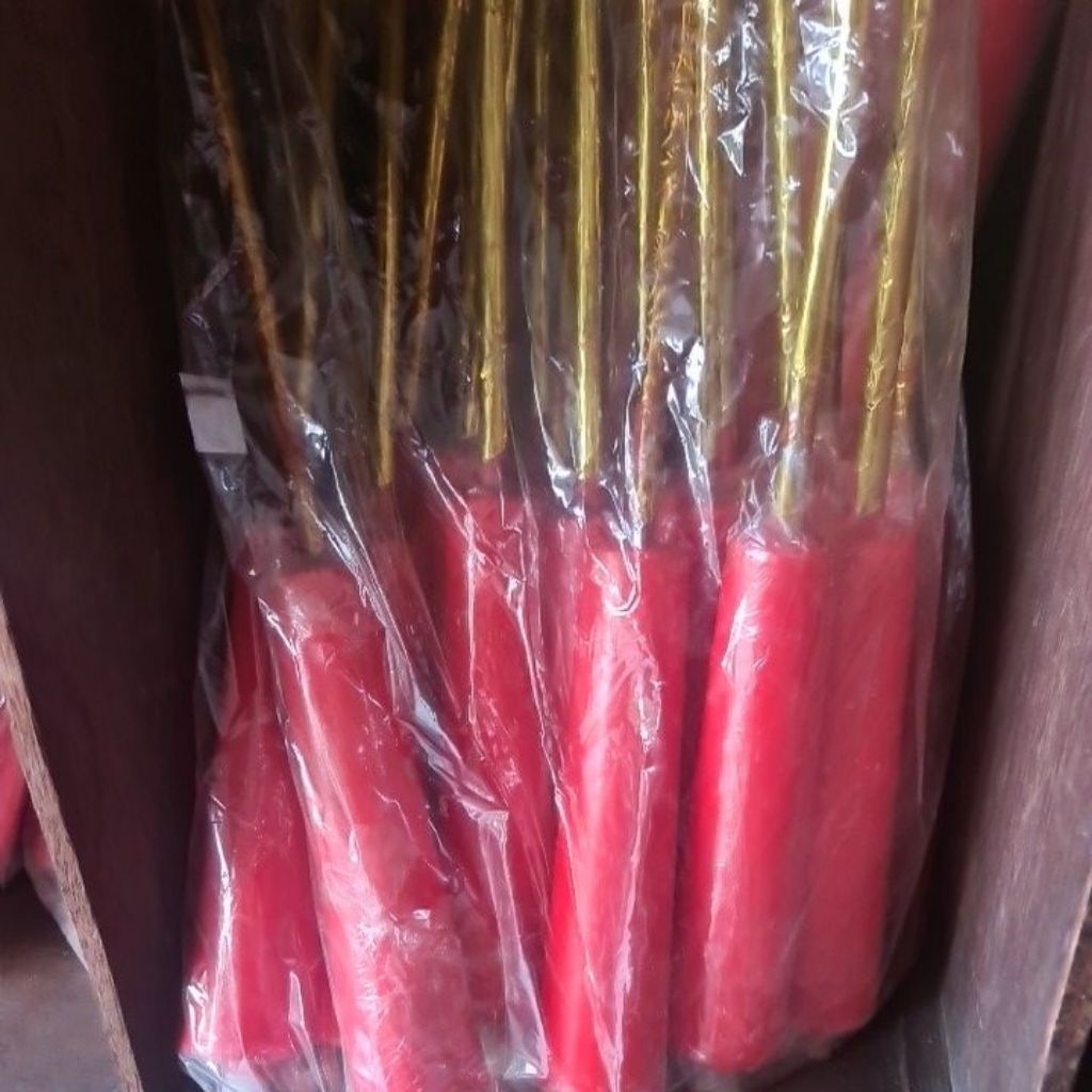 lilin kaki merah sepasang