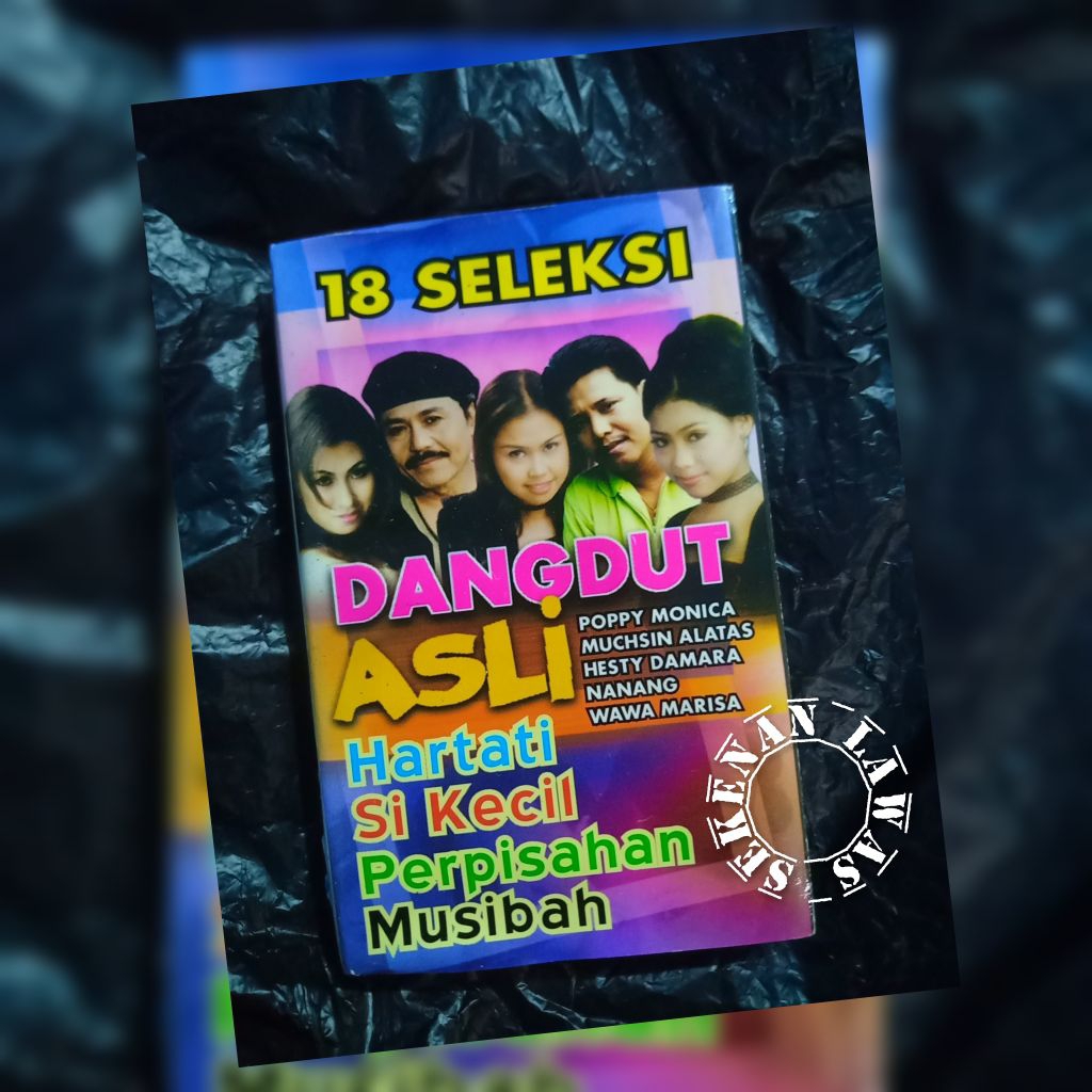Kaset 18 Seleksi Dangdut Asli (Cover Samping Ada Bekas Stiker) / Muchsin Alatas, Poppy Monica, Wawa 