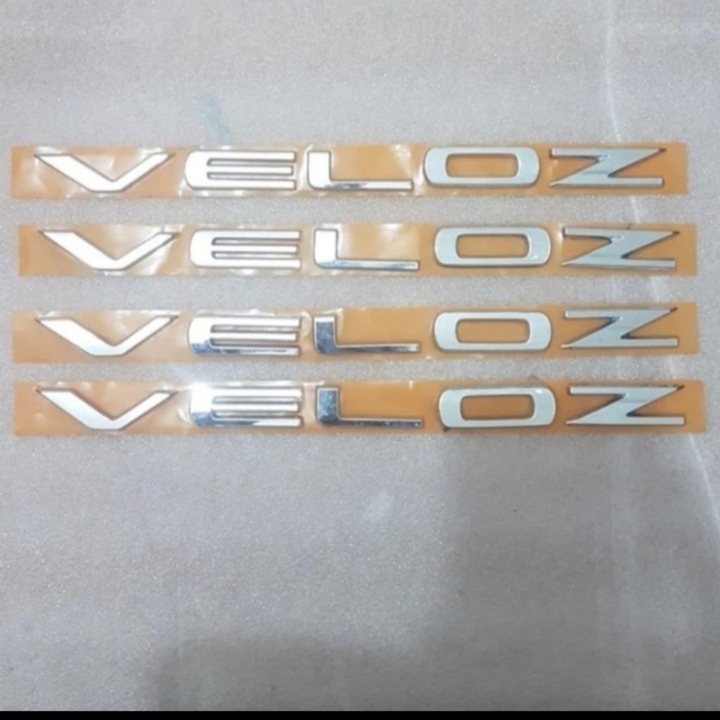 Emblem Depan Kap mesin Veloz 2022