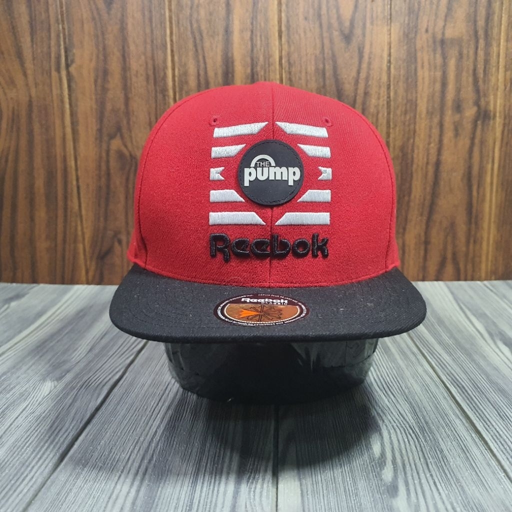 Topi Snapback Reebok Pump
