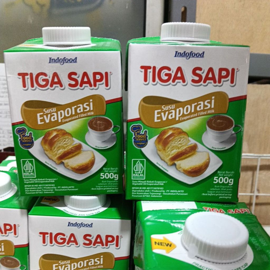susu evaporasi tiga sapi hrga 1dus 12pcs