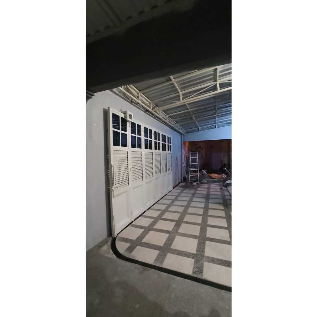 Pintu garasi lipat tikung