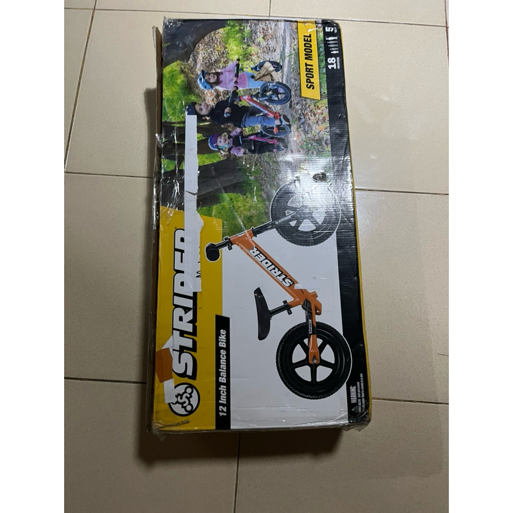 preloved Strider balance bike warna orange sport 12