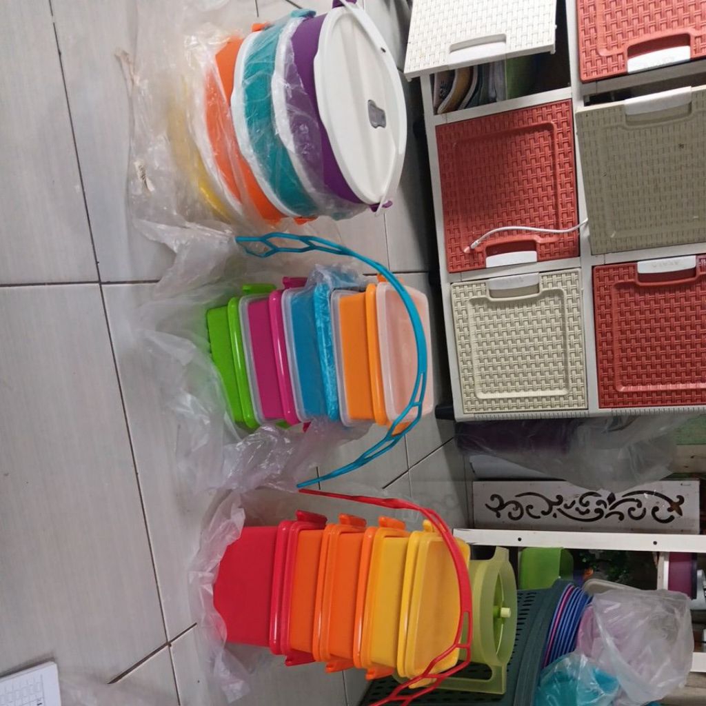 click to go round tupperware