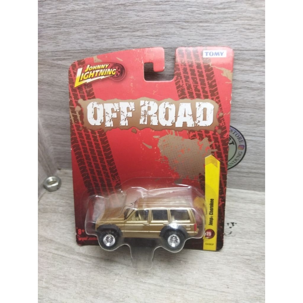 johnny lightning jeep cherokee gold