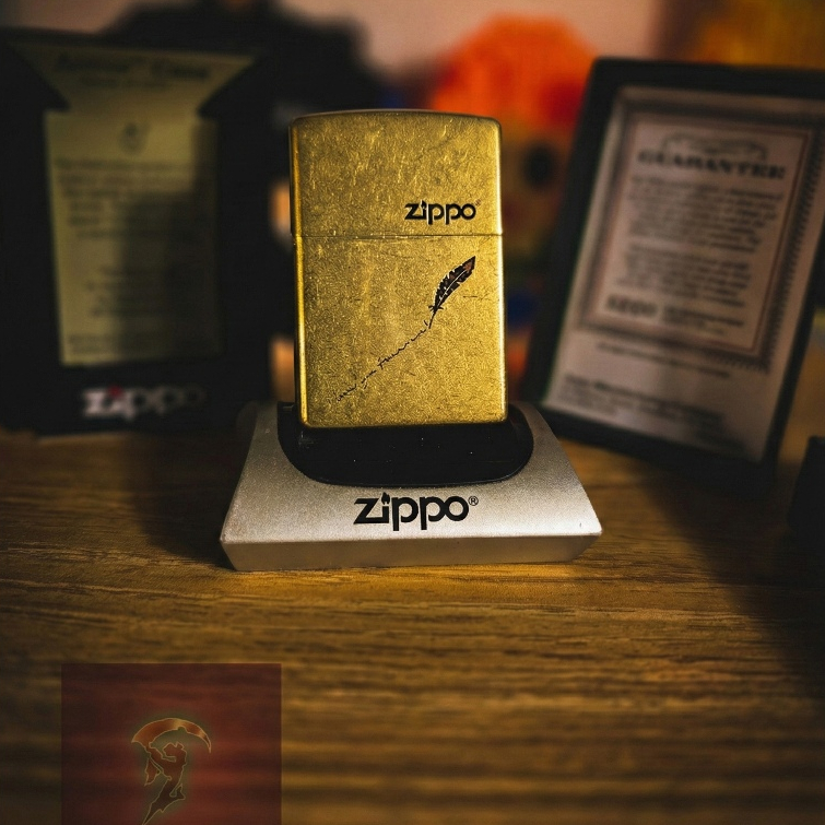 ZIPPO FEATHER SIGN GOLD BRASS LIMITED EDITION MADE IN USA