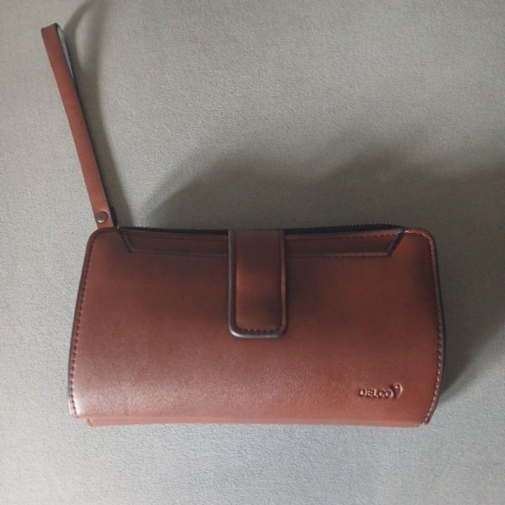 dompet tas chlutch merek delco