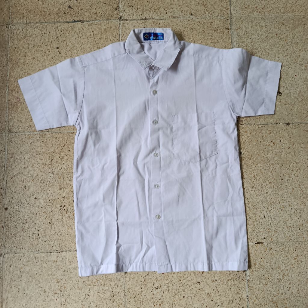 PL baju sekolah putih merk seragam / tan 175