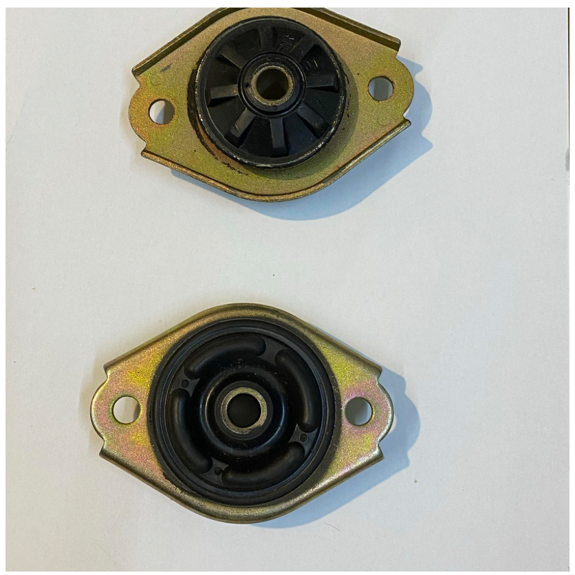 Mounting shock belakang Fiat Uno