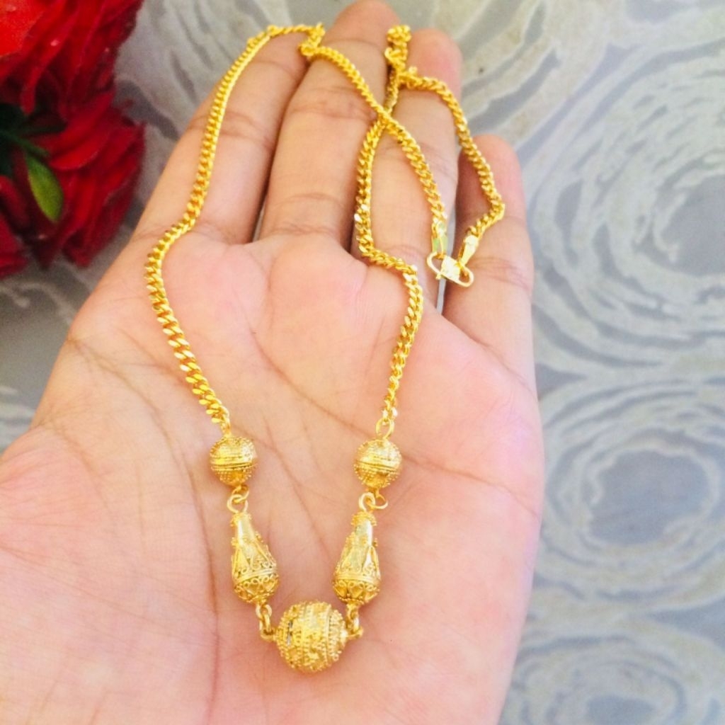 kalung  Bola_Bola ukiran khas Bali