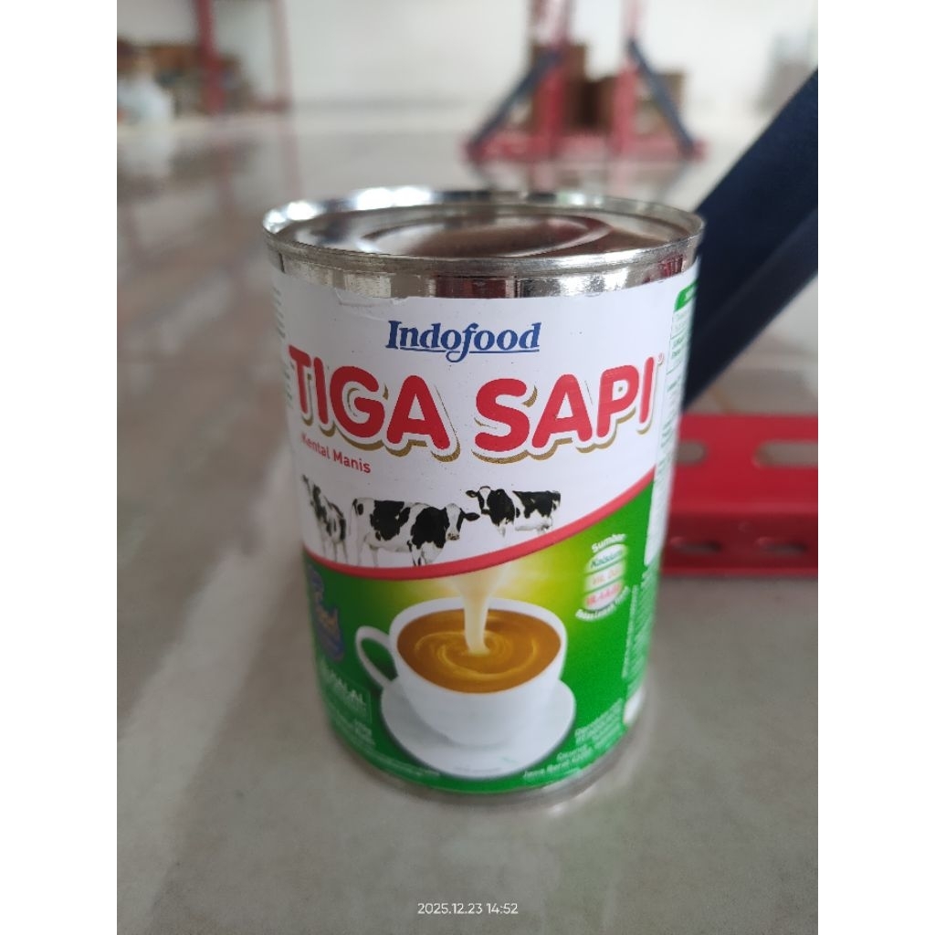 susu kaleng tiga sapi