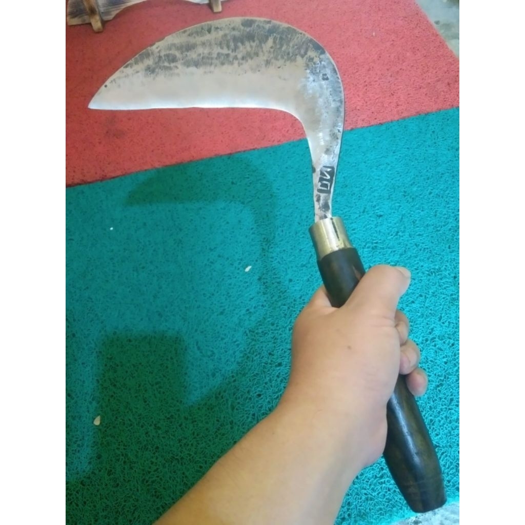 alat tani arit rumput