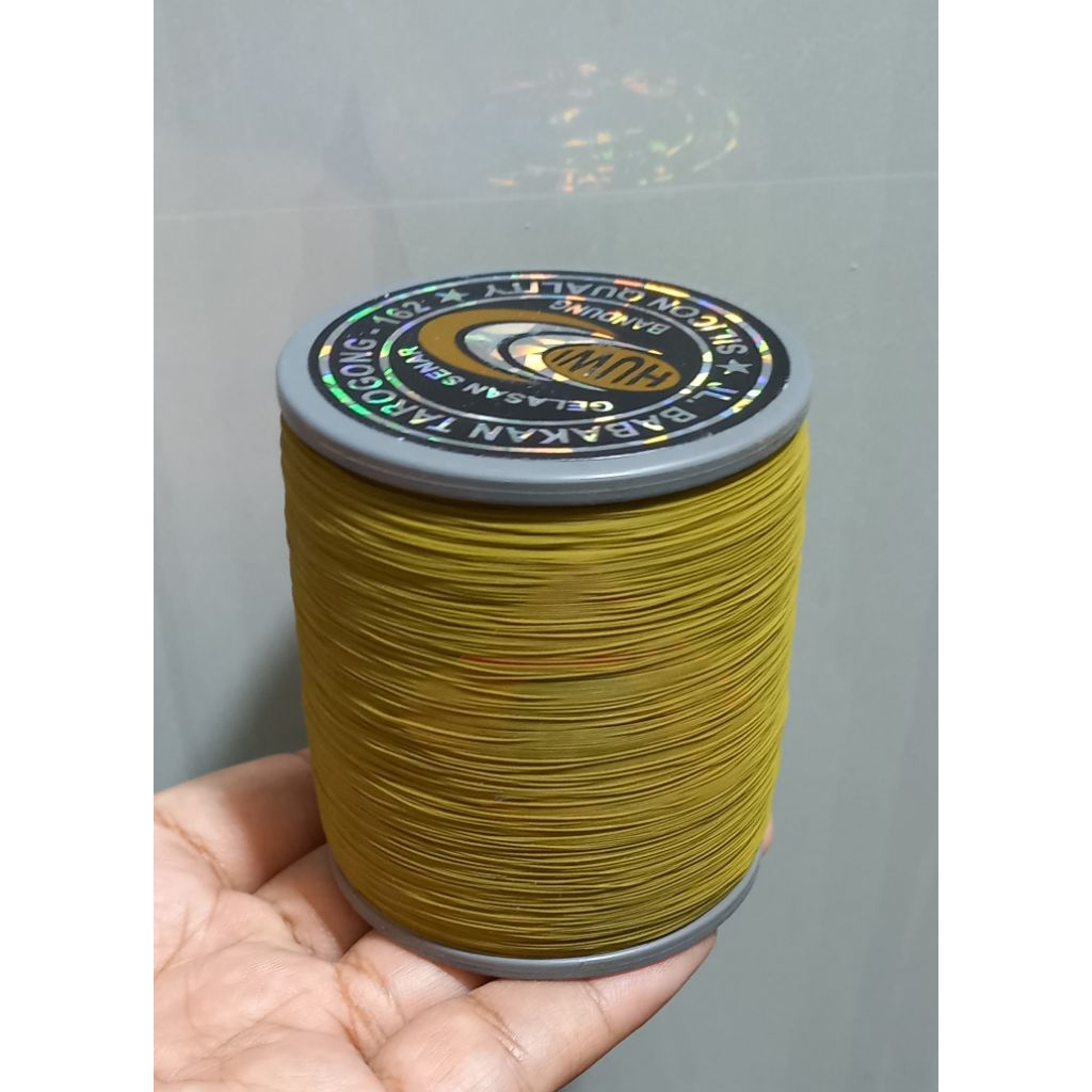 gelasan Huwi Label Hitam Gold Molor 0.22 Original 2025