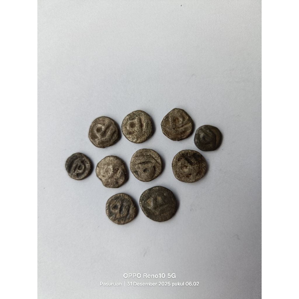 koin kuno sandi perak era sriwijaya  barang temuan