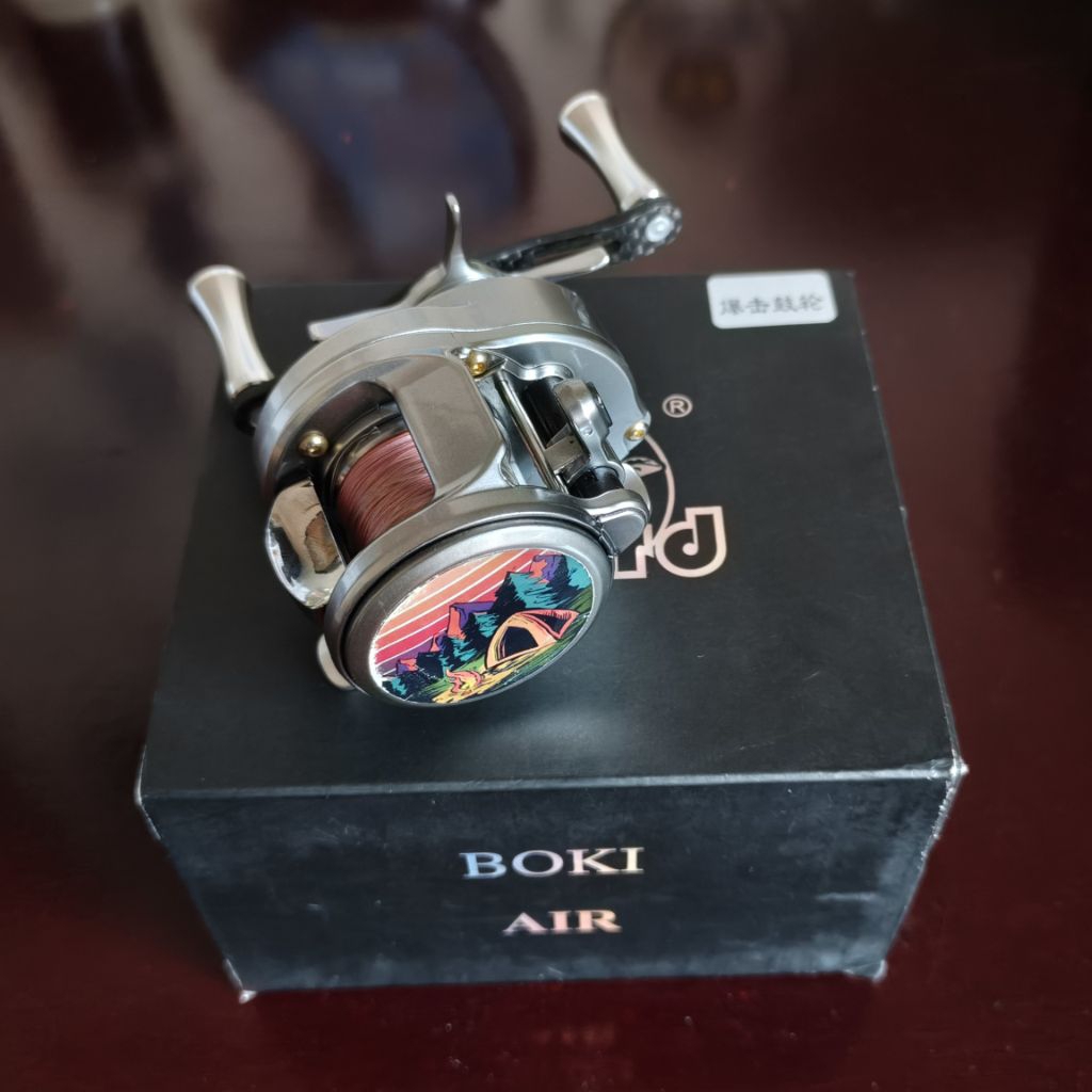 Reel Drum Lizard Boki