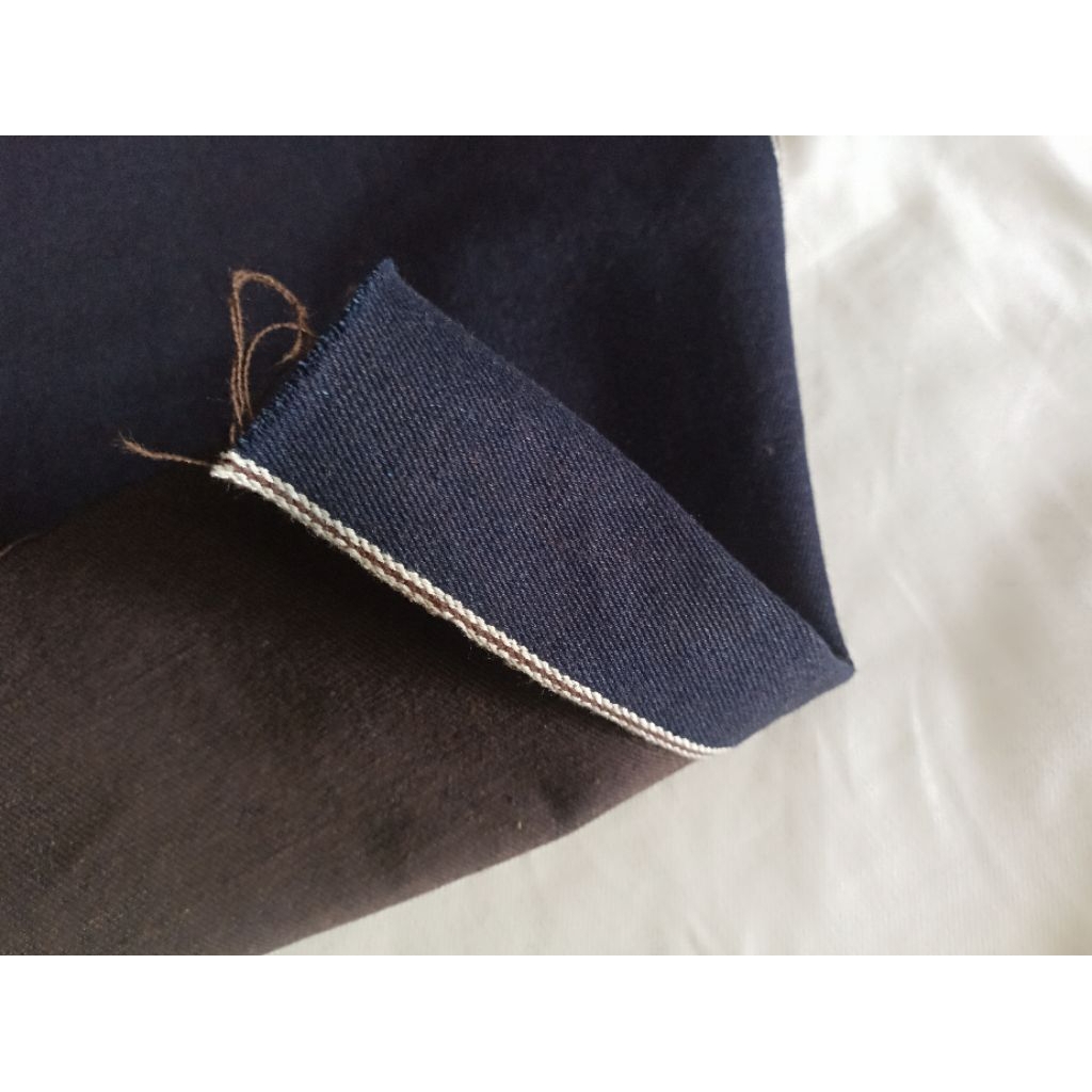 DRMBS.CO KAIN DENIM SELVEDGE BROWN WEFT SELVEDGE 18 OZ TEBAL RED SELVEDGE LINE RAW  UNZANFORIZE