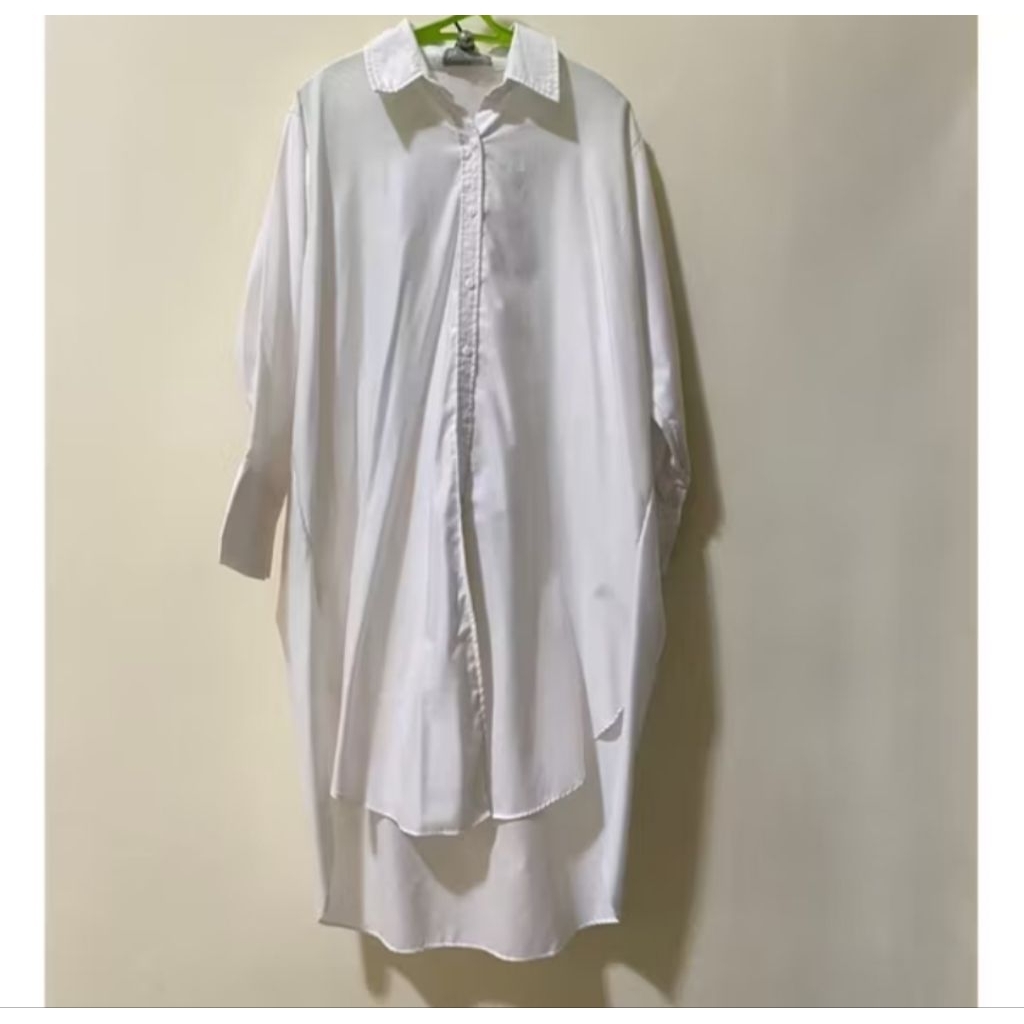 Tunik broken white radwah omara preloved