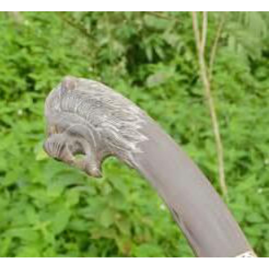 gagang golok tanduk kerbau hitam ukiran singa