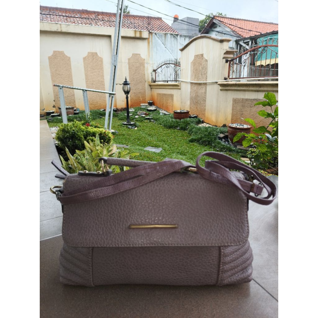 Tas kulit wanita warna ungu