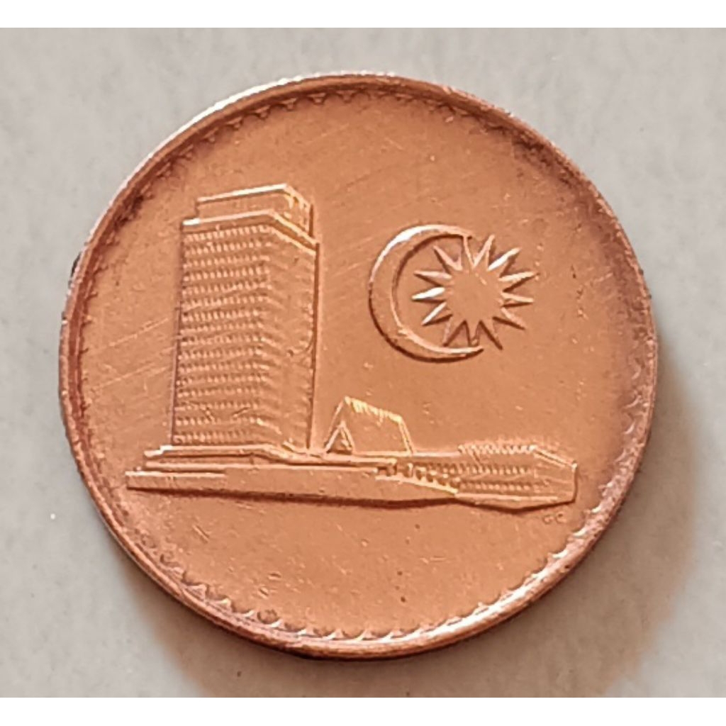 koin sylling Malaysia 1 sen ( warna merah) tahun 1988..