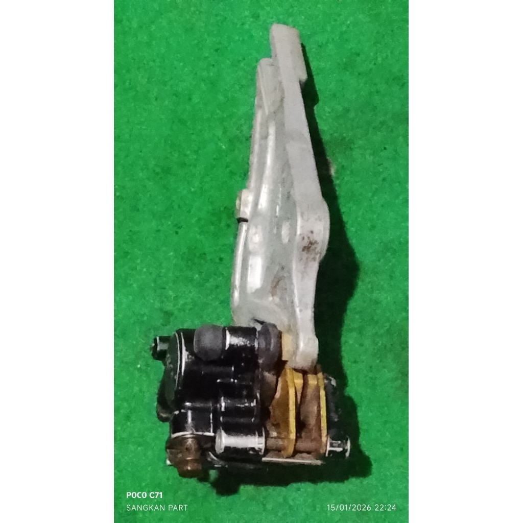 kaliper+dudukan cakram belakang Supra 125