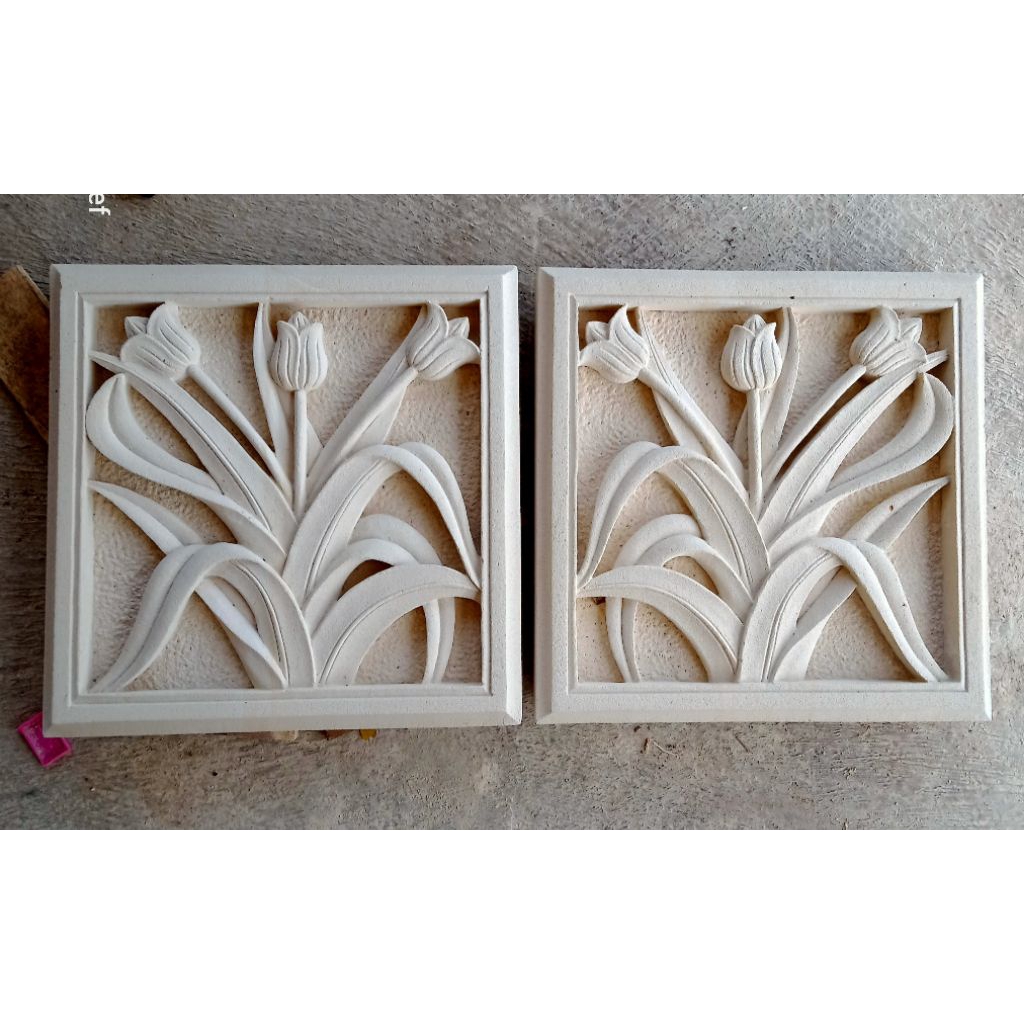 relief ukir batu alam motif bunga