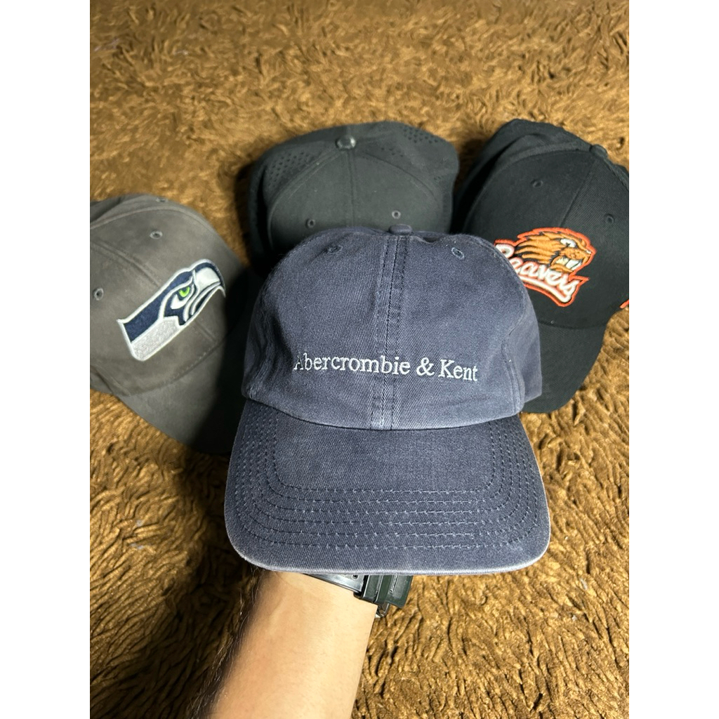 Topi Abercrombie & Kent