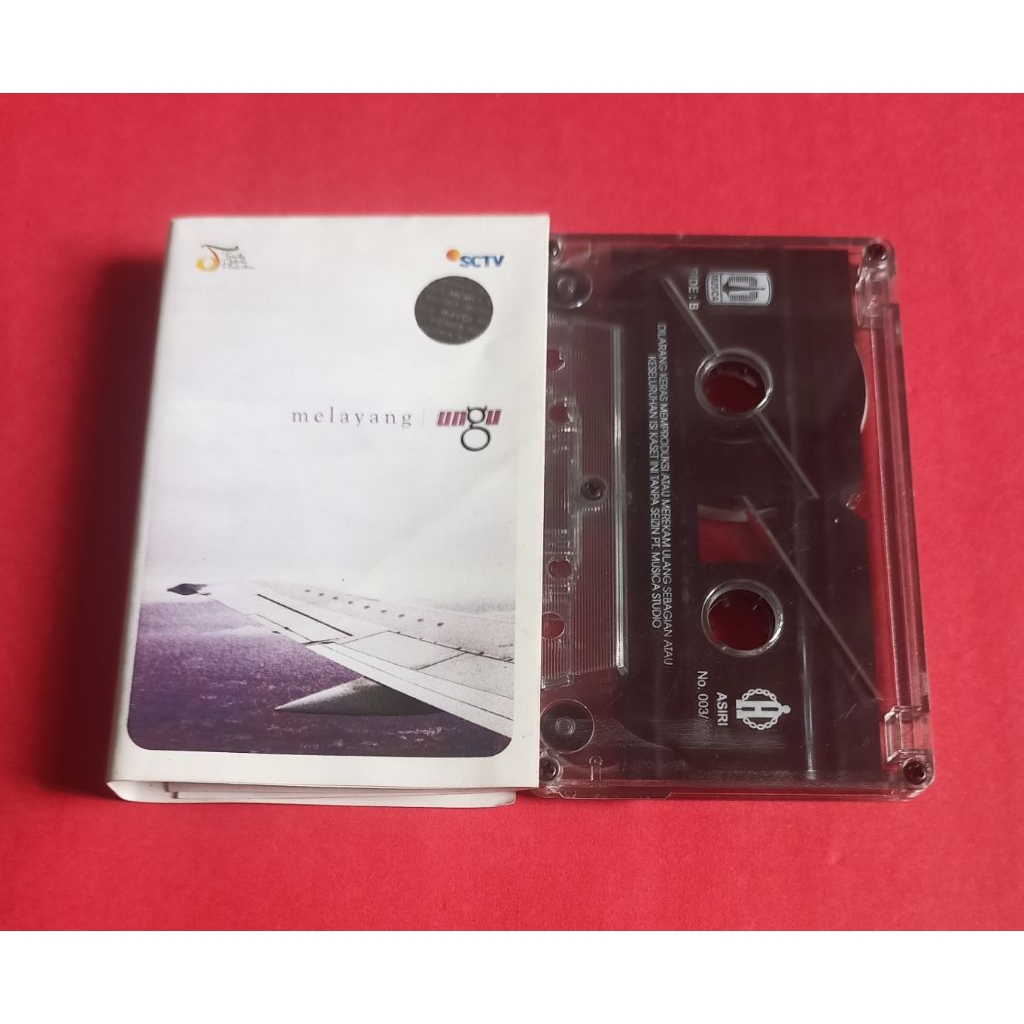 kaset pita UNGU / Melayang