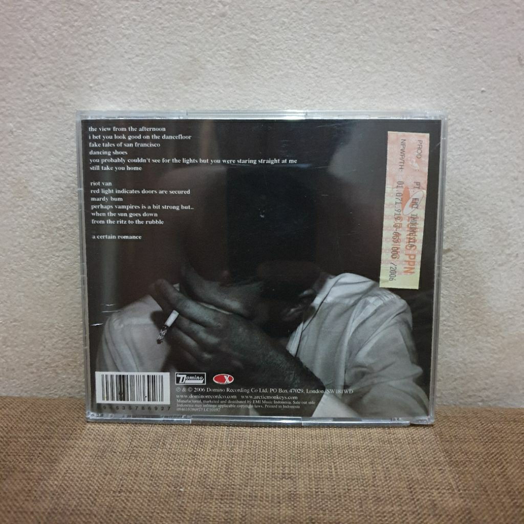 CD Musik Original Arctic Monkeys Whatever People Say I Am That's What Im Not