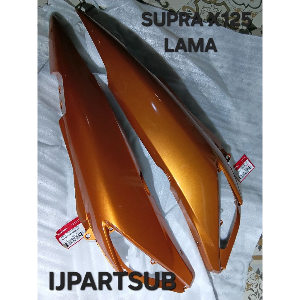 COVER BODY SAMPING SUPRA X125 LAMA SET ORANYE ORIGINAL