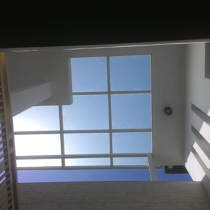 Kanopi Rangka Besi Hollow Atap Kaca Tempered