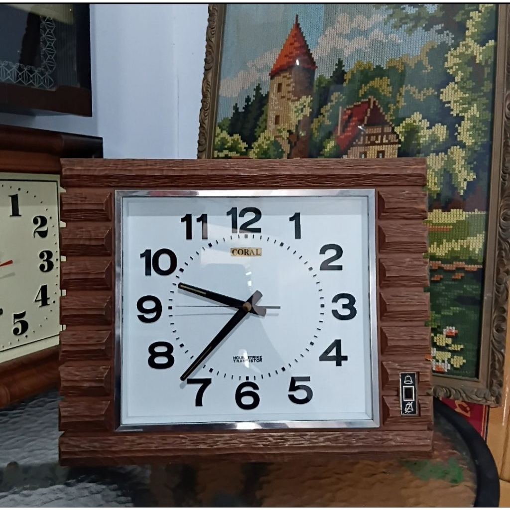 jam dinding coral transistor