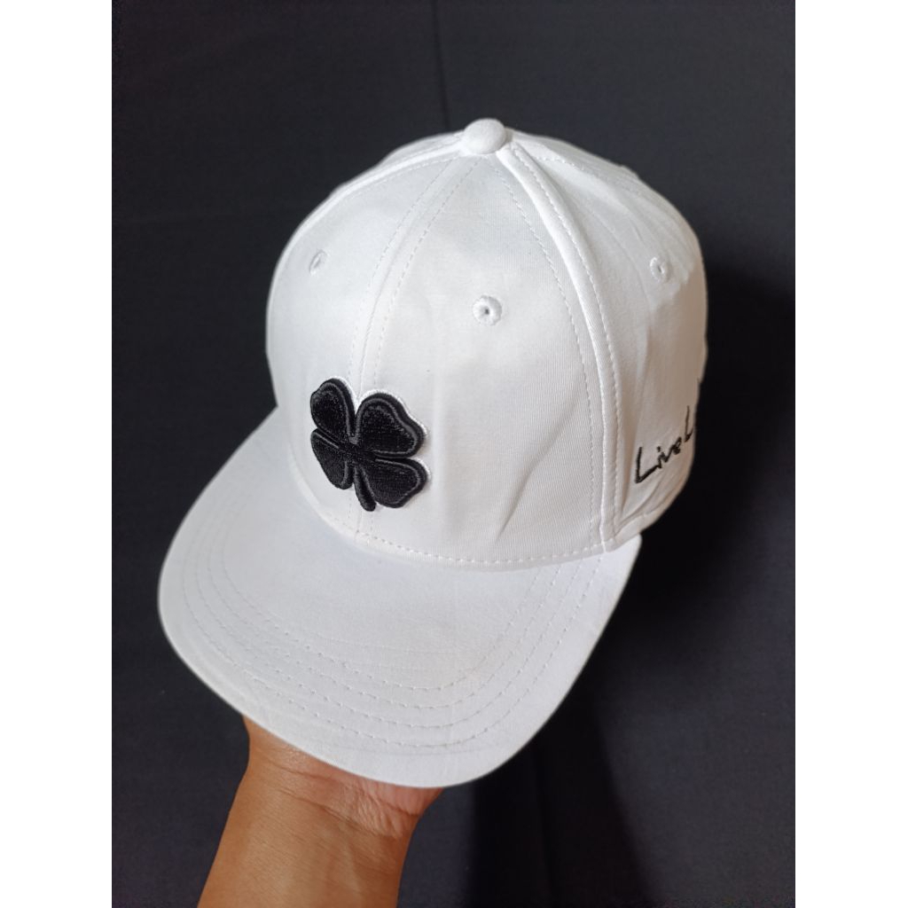 topi golf pria black clover original