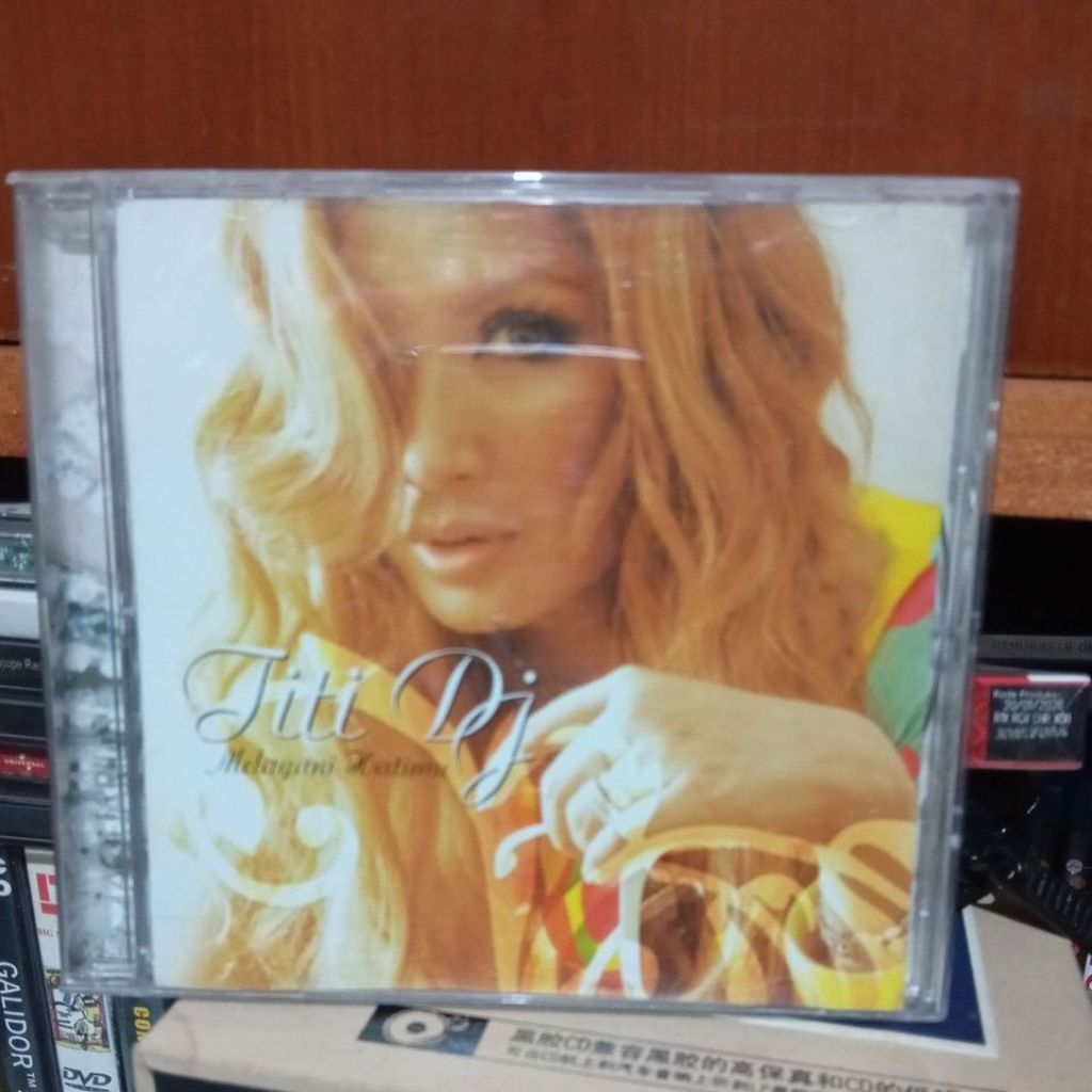 cd Titi DJ melayani hatimu