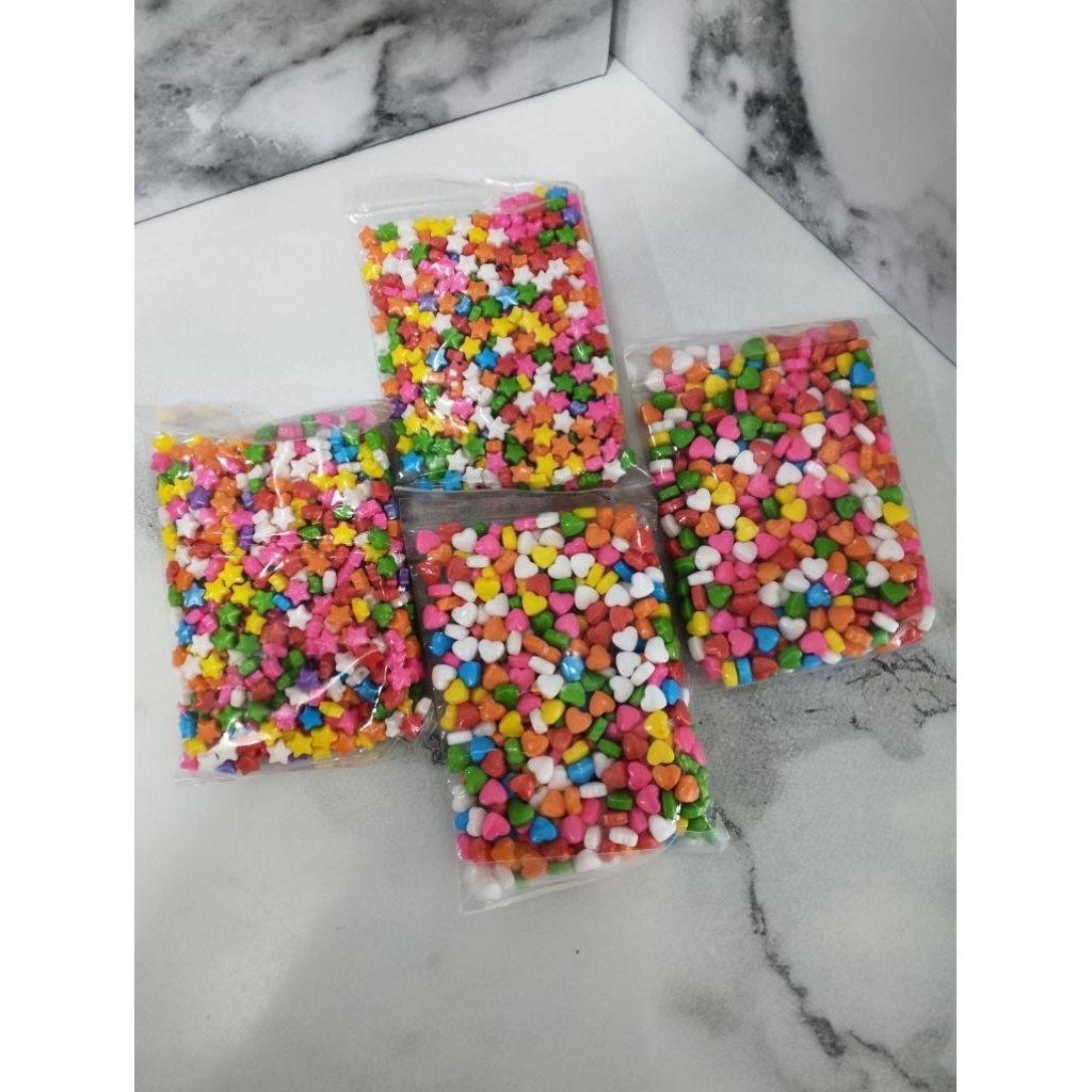 SPRINKLE BINTANG WARNA WARNI KEMASAN 50GR/SPRINKLE STAR WARNA WARNI 50GR