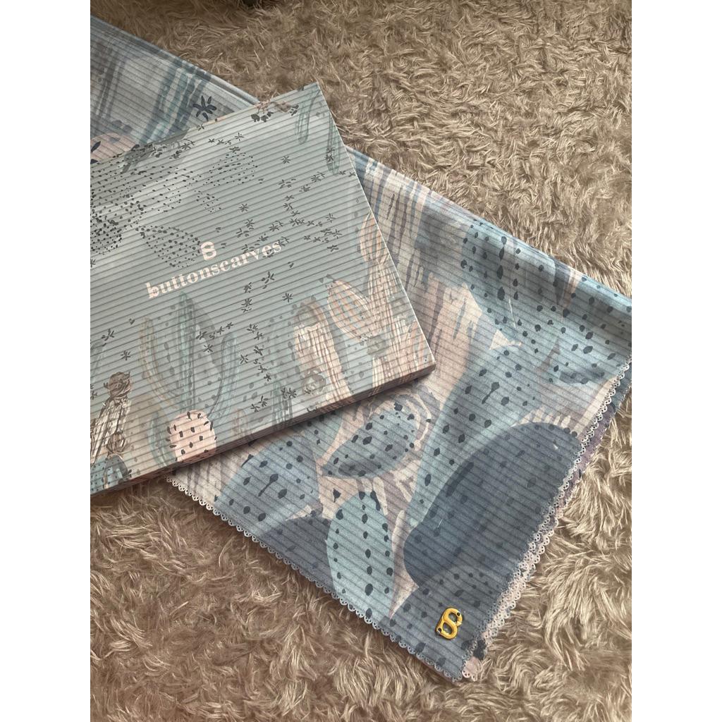 The Opuntia Buttonscarves - sky