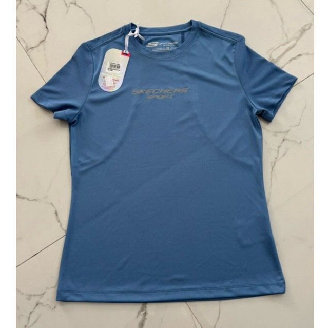 KAOS OLAHRAGA WANITA LENGAN PENDEK SKECHERS WARNA BIRU UKURAN M MASIH BARU DAN ADA LABELNYA BELI DI 