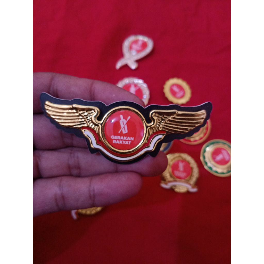 pin logo ormas GERAKAN RAKYAT model wing magnet
